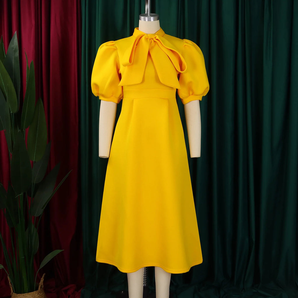 👑 QUEEN BOW — ROBE PLISSÉE À NŒUD SIGNATURE