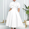 👑 QUEEN BOW — ROBE PLISSÉE À NŒUD SIGNATURE