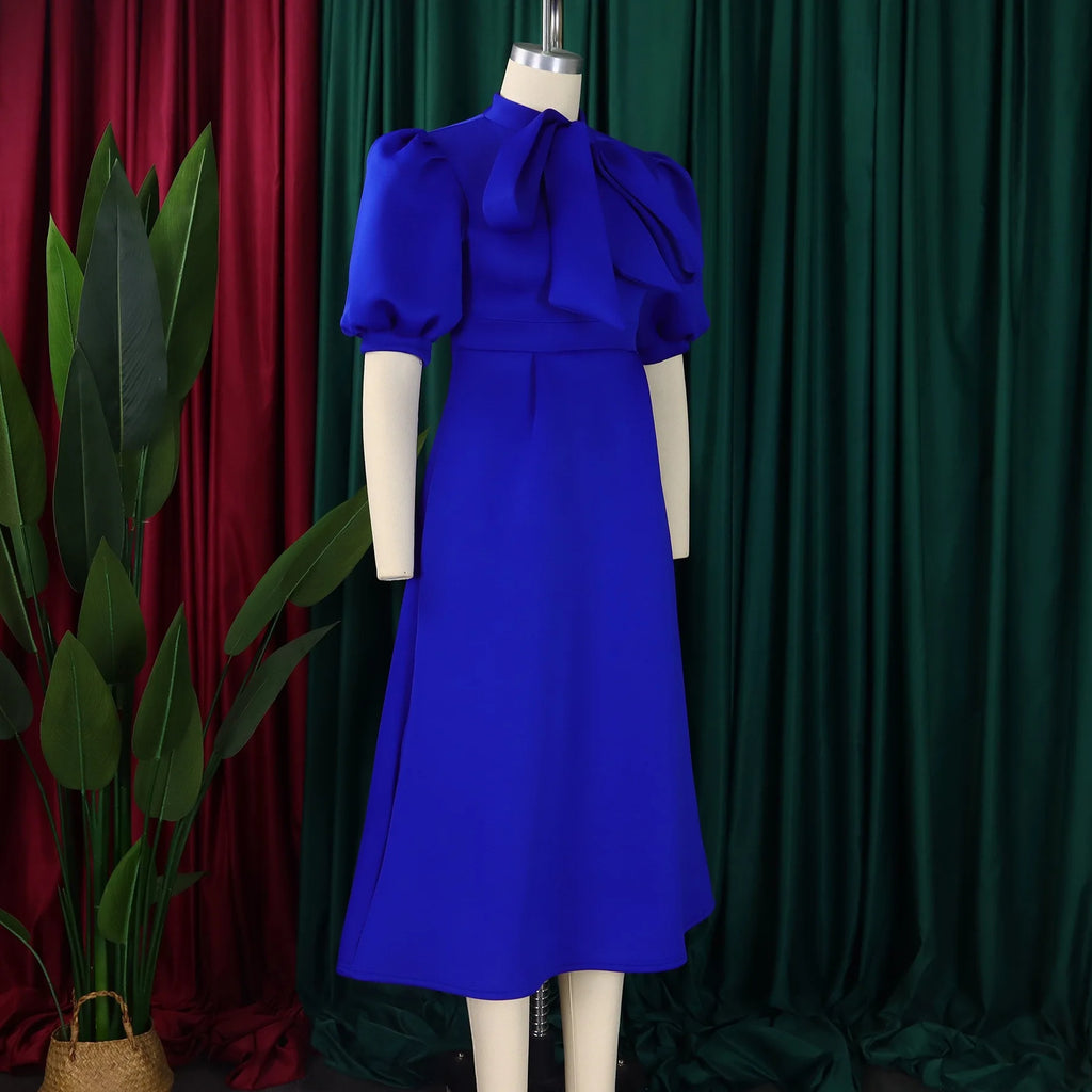 👑 QUEEN BOW — ROBE PLISSÉE À NŒUD SIGNATURE