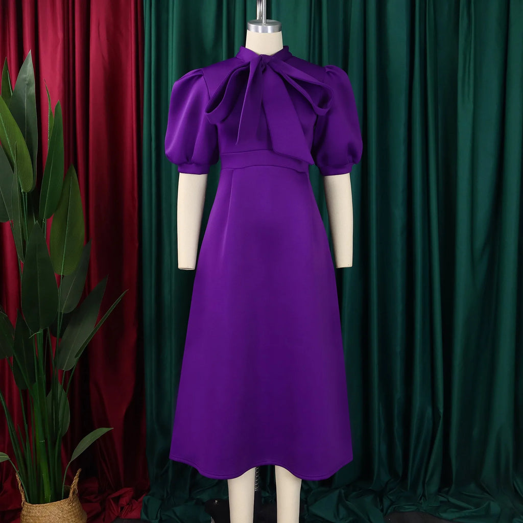 👑 QUEEN BOW — ROBE PLISSÉE À NŒUD SIGNATURE