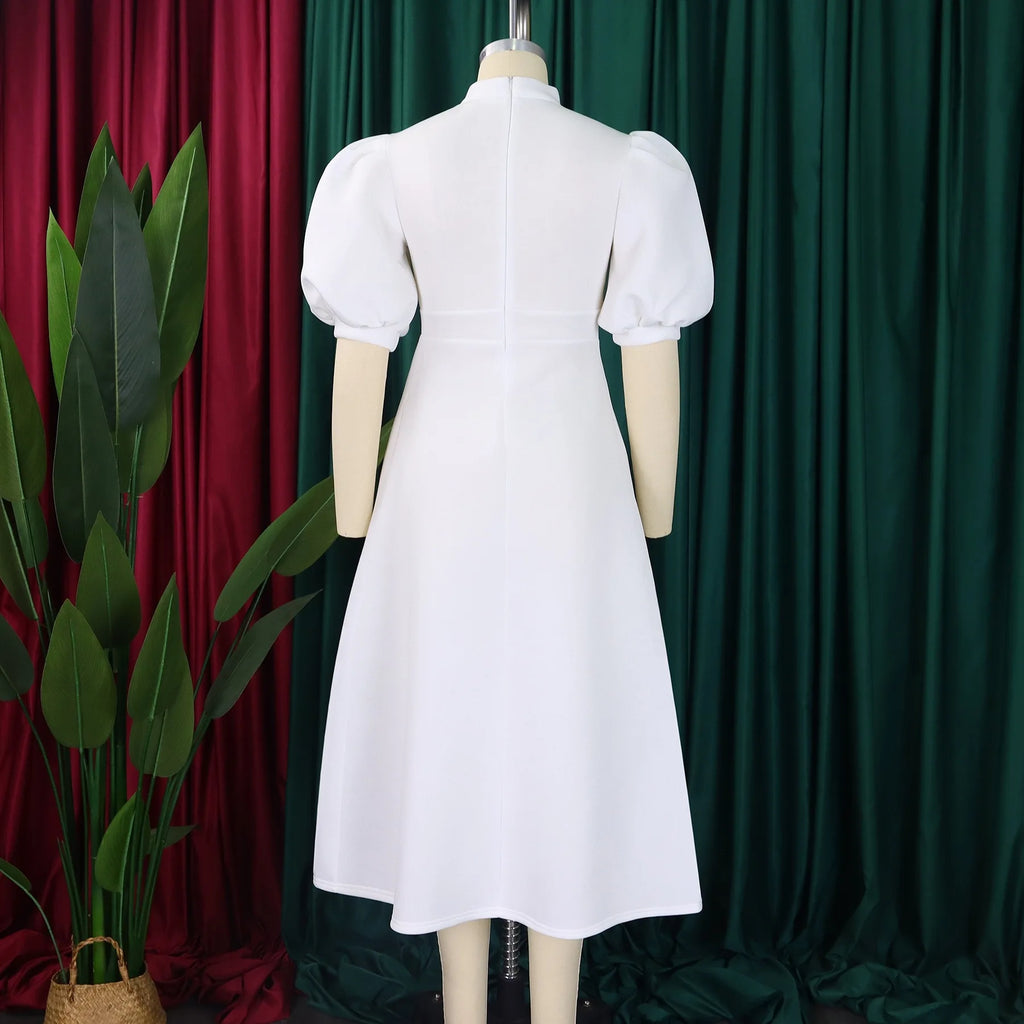 👑 QUEEN BOW — ROBE PLISSÉE À NŒUD SIGNATURE