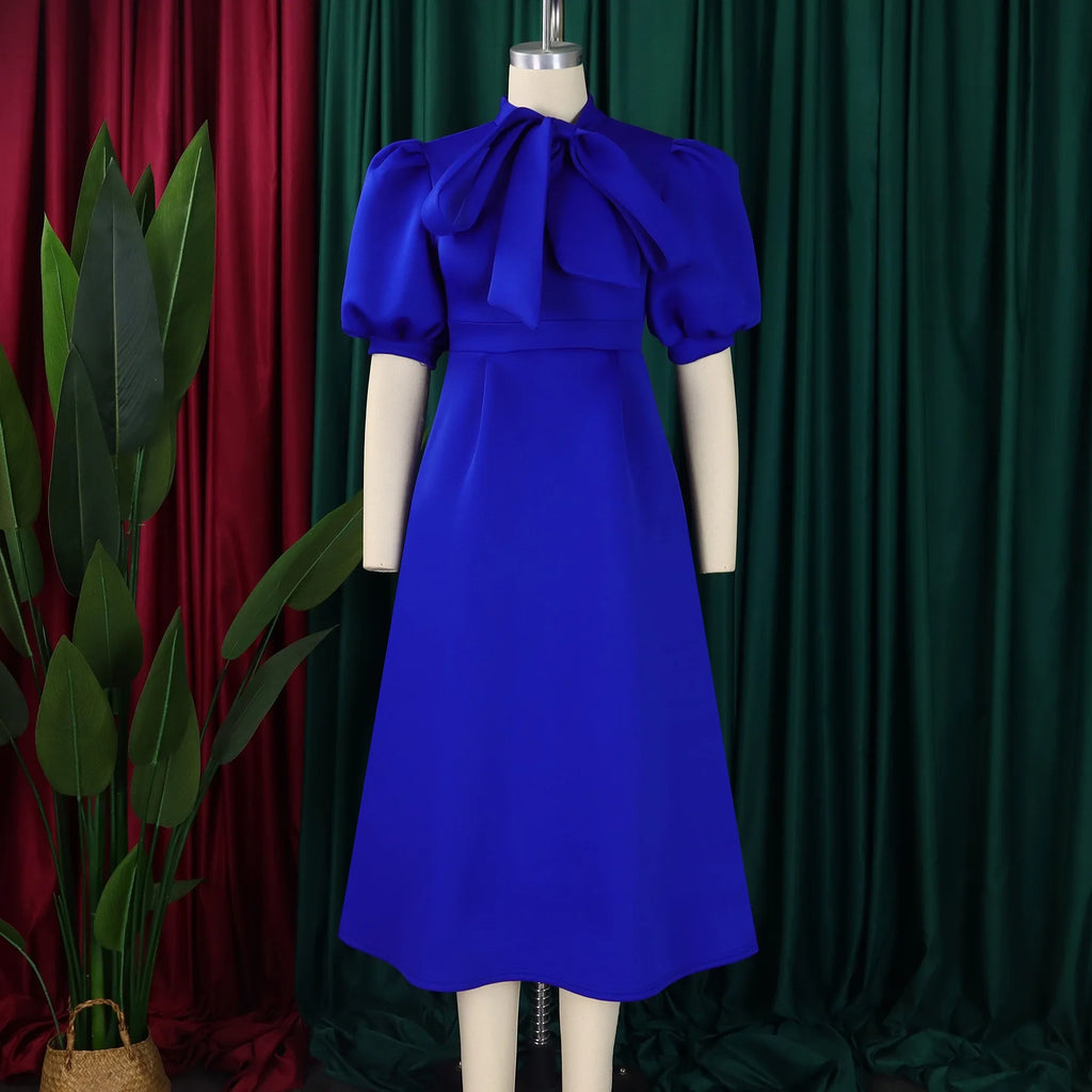 👑 QUEEN BOW — ROBE PLISSÉE À NŒUD SIGNATURE